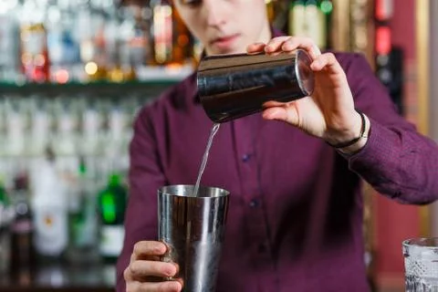 The bartender making cocktail Stock Photos