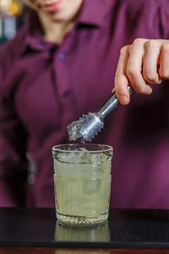 The bartender making cocktail Stock Photos