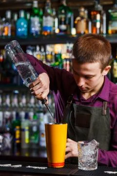 The bartender making cocktail Stock Photos