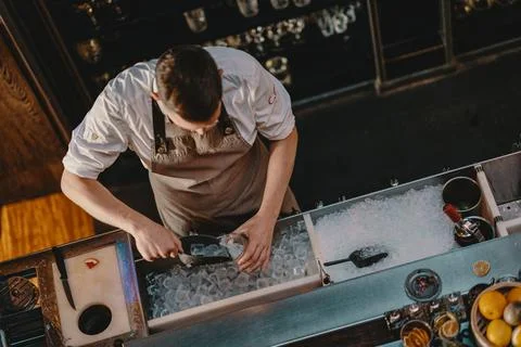 Bartender making cocktail Stock Photos