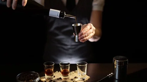 Bartender making a cocktail shot Stock Footage 125212529