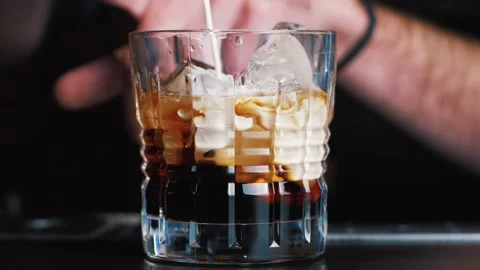 Bartender making cocktail white russian Stock Footage 160606948