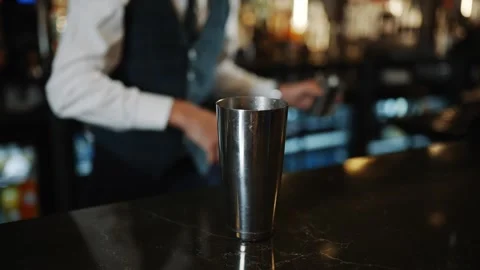 A bartender is making a drink in a bar Stock-Footage 295995925