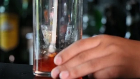 Bartender making the glass of cocktail. Video stock 124681877