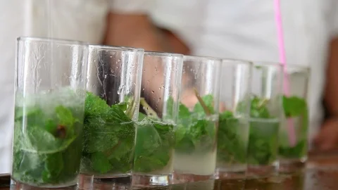 Bartender making Mojitos at bar in Havana Cuba 스톡 동영상 90918874