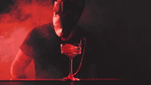 Bartender in mask prepares a cocktail at the bar Stock Footage 219501644