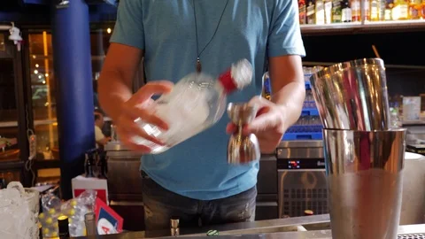 Bartender measuring alcohol Stock Footage 93308049