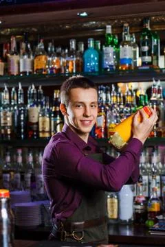 The bartender mixing cocktail Stock Photos