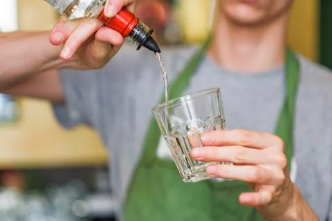 Bartender mixing a cocktail Stock Photos