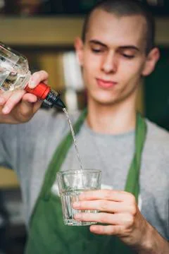 Bartender mixing a cocktail Stock Photos