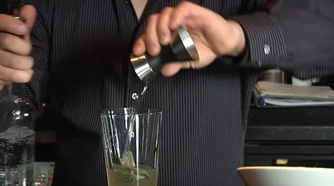 Bartender mixing a drink Stock Footage 20462396