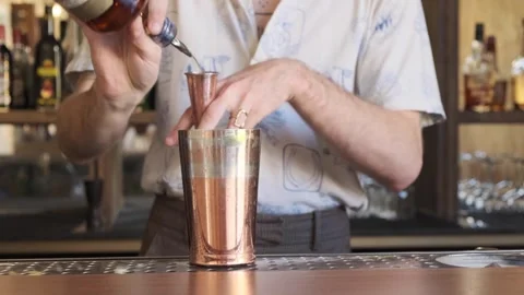 Bartender Mixing Drinks Behind Retro Counter Stock Footage 318657934