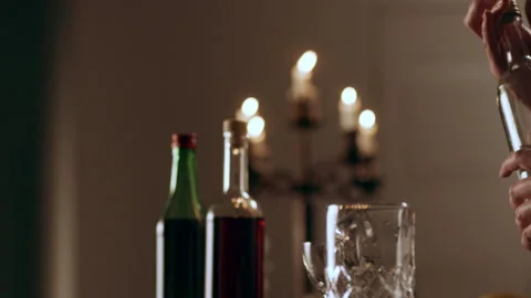 Bartender mixologist measuring alcohol with jigger and pouring shots of liquor i Video stock 199457902