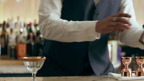 Bartender mixologist tossing shaker making classic Daiquiri cocktail in a beauti Stock Footage 199455336