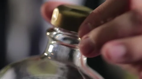 The bartender opens a bottle of elite alcohol, whiskey, brandy, close-up, macro Stock-Footage 50166867