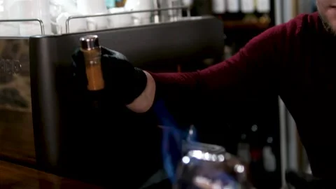 Bartender performing flair bartending with bottles and fireworks in slow motion Stock Footage 320772998