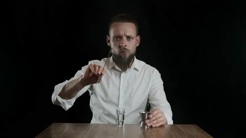 The bartender playing with cocktail spoon Stock Footage 132771887