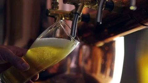 Bartender Pouring Beer In The Bar. Close-up Stock Footage 73639840