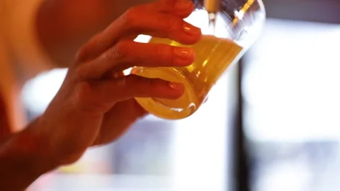 Bartender pouring beer in the bar Stock Footage 133376851