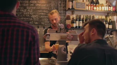 Bartender Pouring Craft Beer For Customers At Tap Room Vídeo Stock 344683727