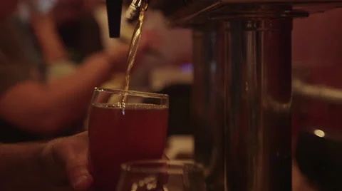 Bartender Pouring Craft Beer from Tap into Pint Glass at Restaurant Bar/Brewery Video stock 61502079