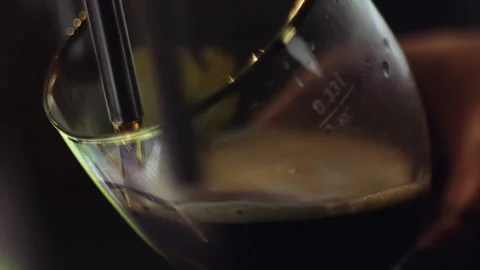 Bartender pouring dark draft beer Stock Footage 170775252