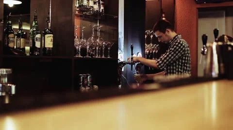 Bartender Pouring Draft Beer Stock Footage 65218066