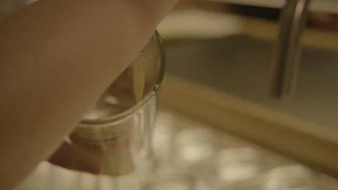 Bartender Pouring Draft Beverage Into Glass at Bar Counter in Beijing, China Stock Footage 345758489