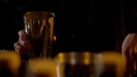 Bartender Pouring Drink with Precision and Care Stock Footage 262611982