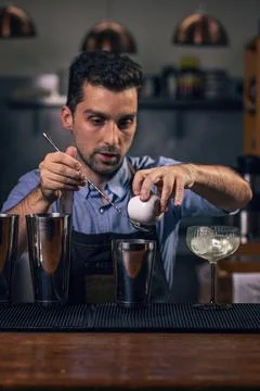 Bartender pouring ingredients Stock Photos