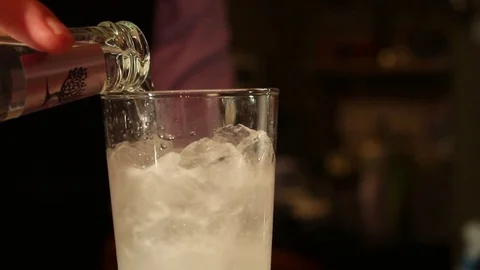 Bartender Pouring &amp; Preparing Cocktail Stock Footage 70737125