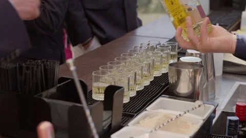 Bartender Pouring Tequila Shots At Corporate Event Bar Stock Footage 337912338
