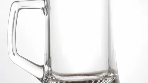 Bartender pours beer into a glass, close-up Stock Footage 128514709