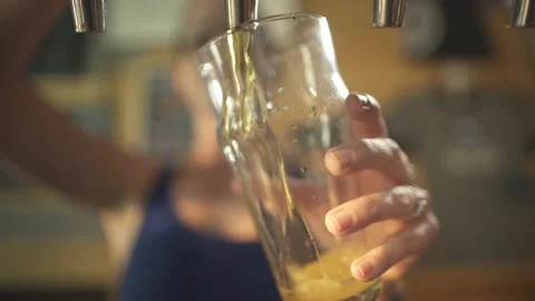 Bartender pours Beer from tap slo motion Stock Footage 167141325