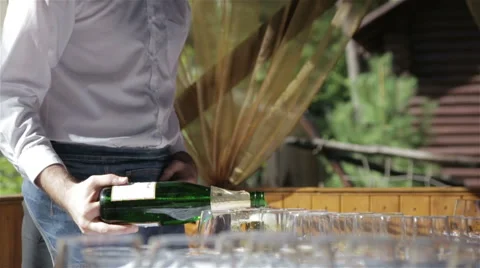 The bartender pours champagne Stock Footage 67470923