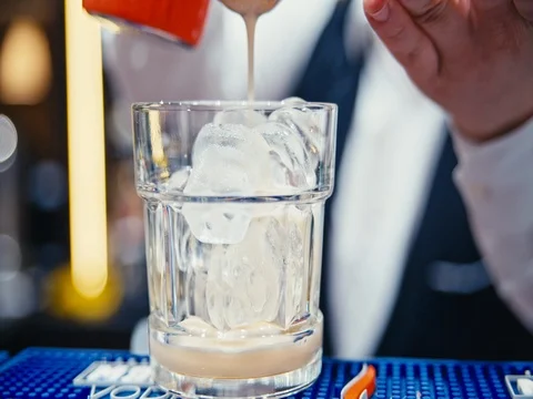 The bartender pours a cocktail Stock Footage 75832226