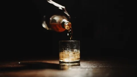 Bartender Pours Drink with Ice Stock Footage 88601221