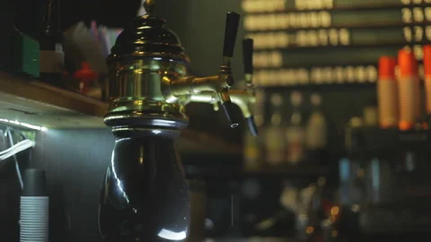 The bartender pours lemon beer. Stock Footage 93218309