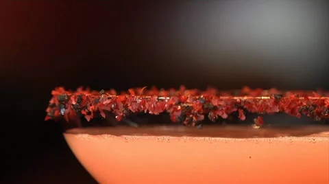 Bartender pours pink martini Stock Footage 20462619
