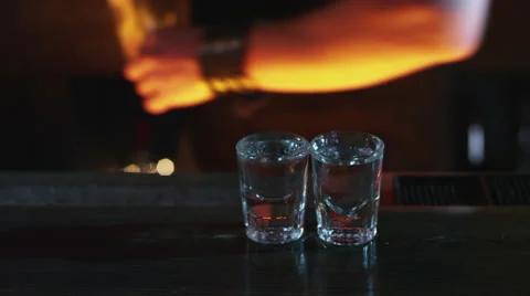 Bartender pours shots at the bar Stock Footage 57816964