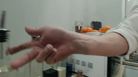 The bartender pours vodka into the shaker. Slow motion Stock Footage 131546532