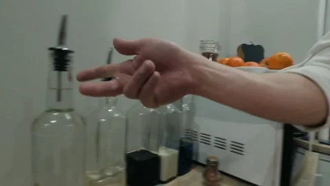 The bartender pours vodka into the shaker. Slow motion Stock-Footage 134035064