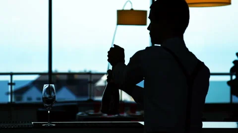The Bartender Pours Wine into a Glass Stock Footage 62743062