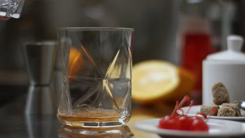 Bartender prepare coctail in modern bar. Barmen stirring and pouring. The sweet Stock Footage 106266848