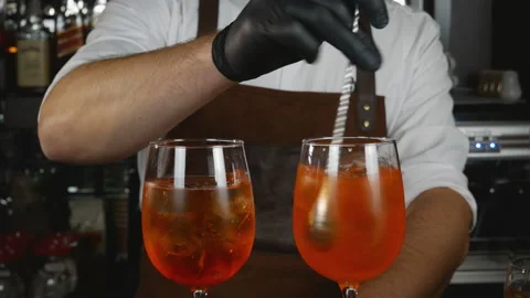 Bartender prepares an alcoholic cocktail Stock Footage 118778683