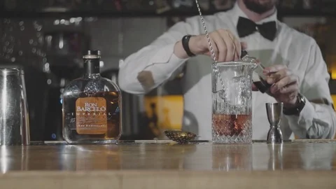 The bartender prepares alcoholic drink Stock Footage 82798099