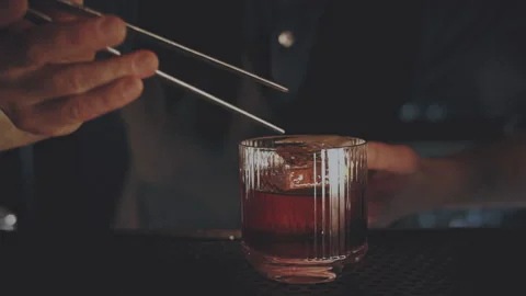 Bartender prepares a cocktail at the bar Stock Footage 167348694
