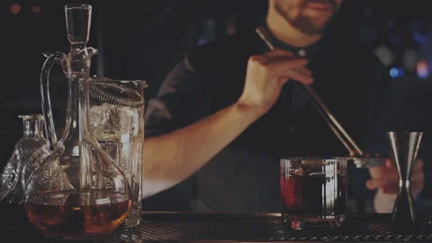 Bartender prepares a cocktail at the bar Stock Footage 167348715