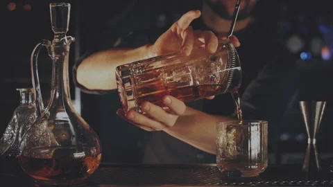 Bartender prepares a cocktail at the bar Stock Footage 167348739