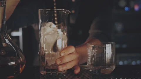 Bartender prepares a cocktail at the bar Stock Footage 167391433